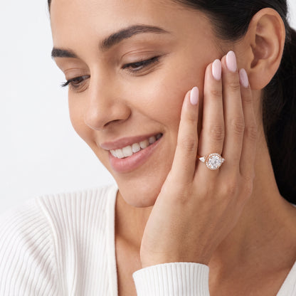 Eliza Halo Sidestone Round Diamond Engagement Ring in Rose Gold - model.jpg