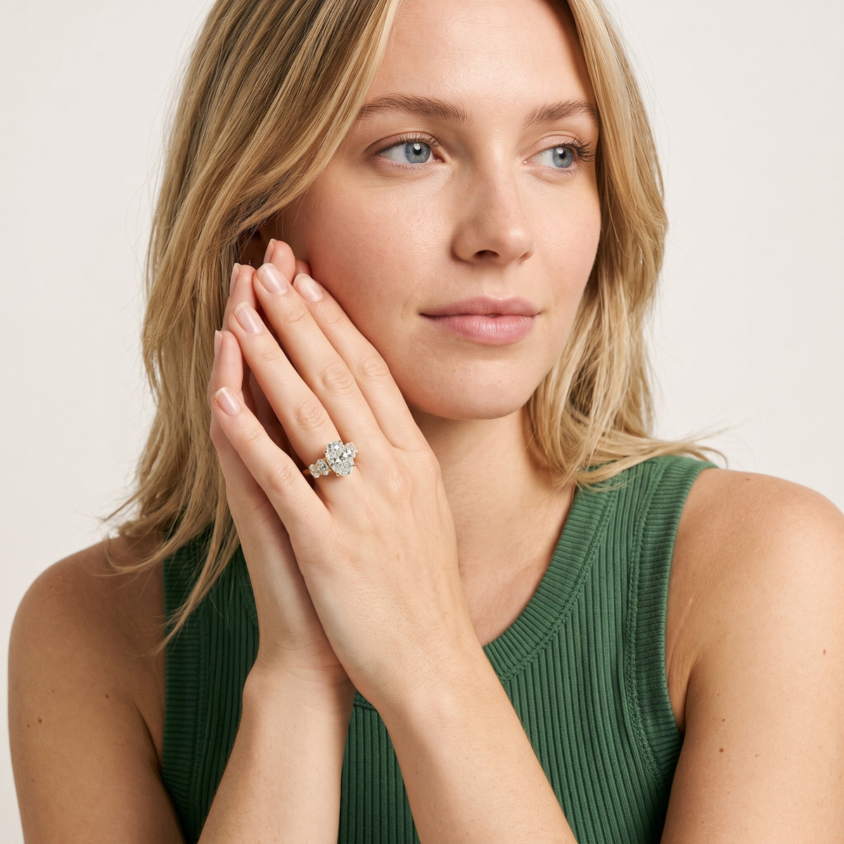 Kathy Graduated Five-Stone Oval Diamond Engagement Ring in Platinum - model.jpg