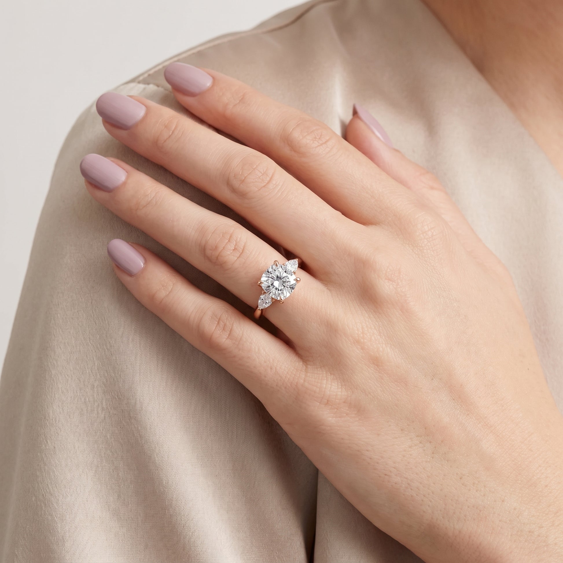 Leila Three-Stone Cushion Diamond Engagement Ring in Rose Gold - model.jpg