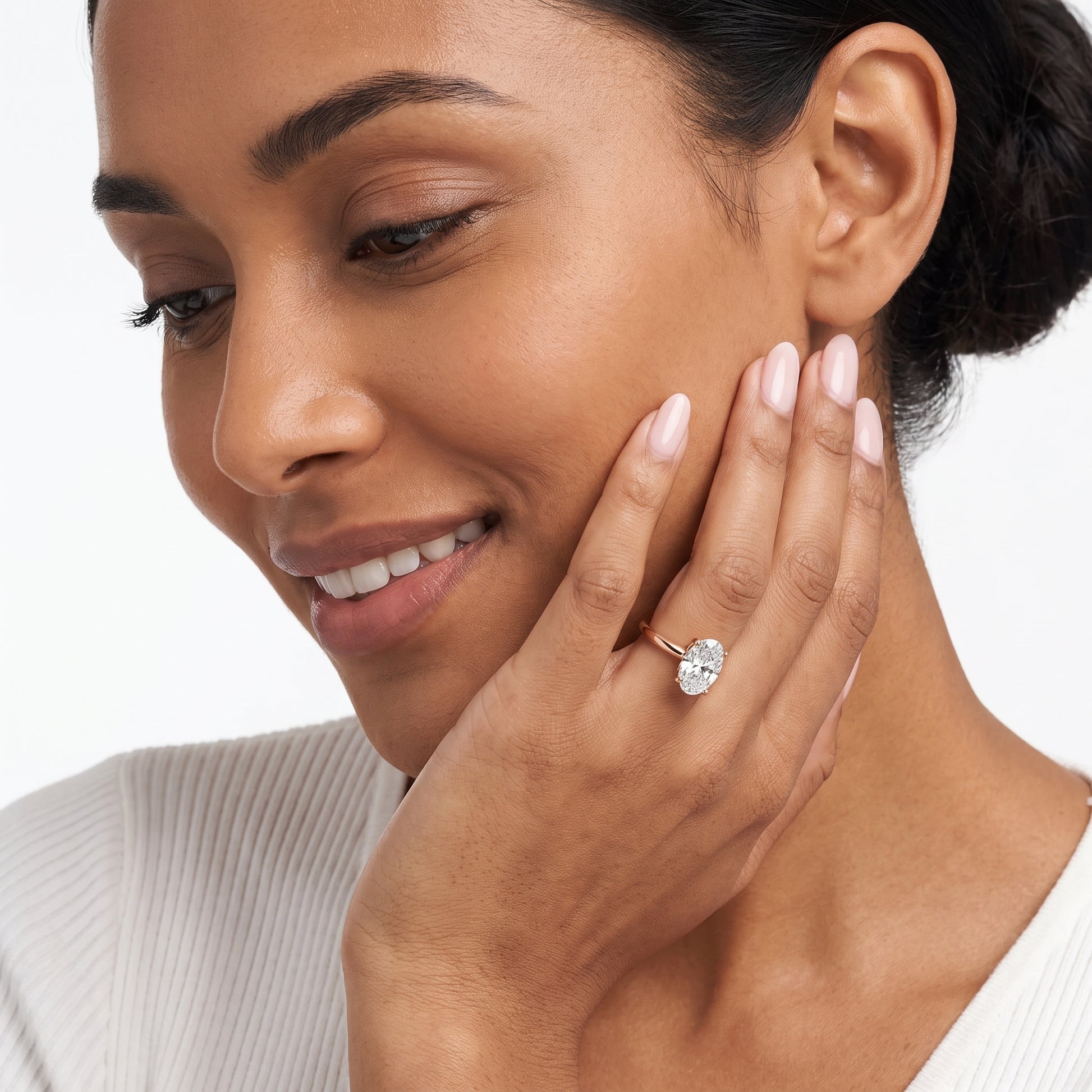 Amira Six-Prong Solitaire Oval Diamond Engagement Ring in Rose Gold - model.jpg