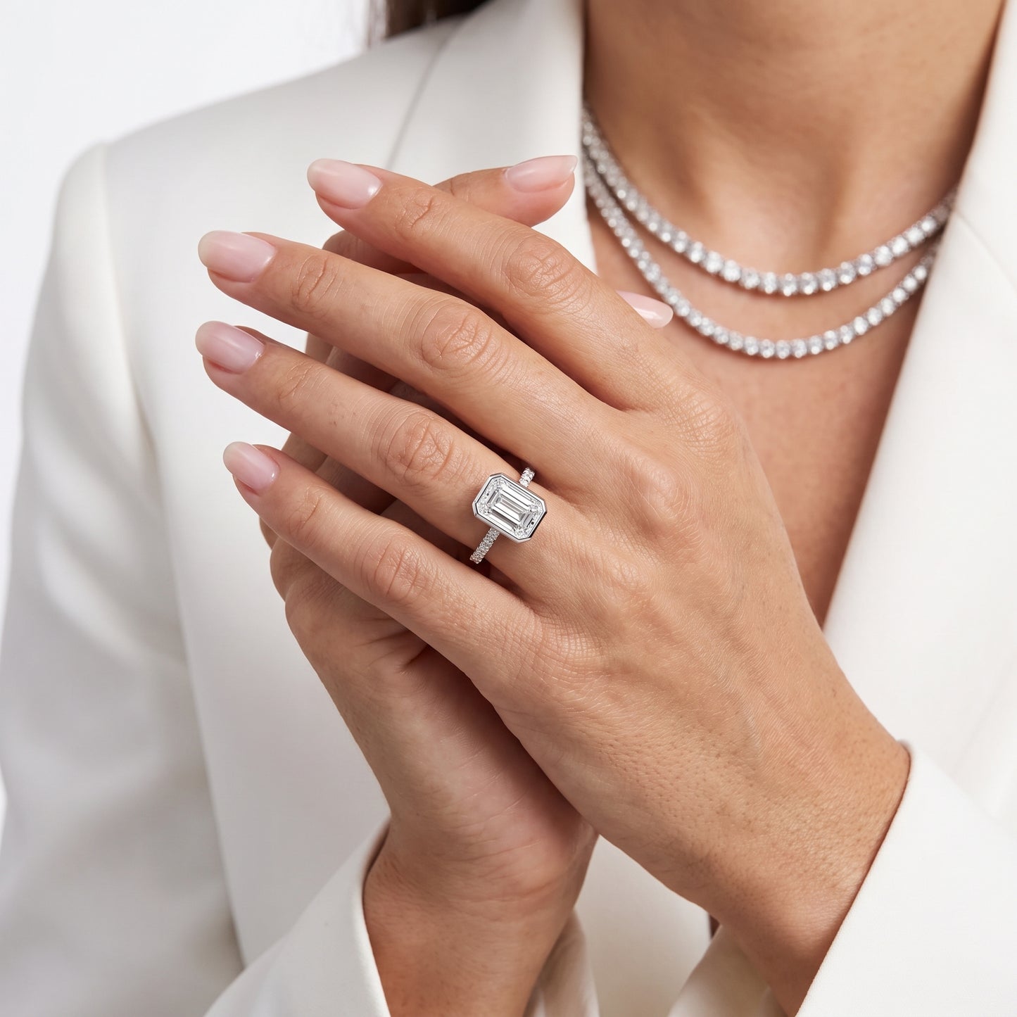 Cora Bezel Pavé Emerald Diamond Ring in Platinum - model.jpg