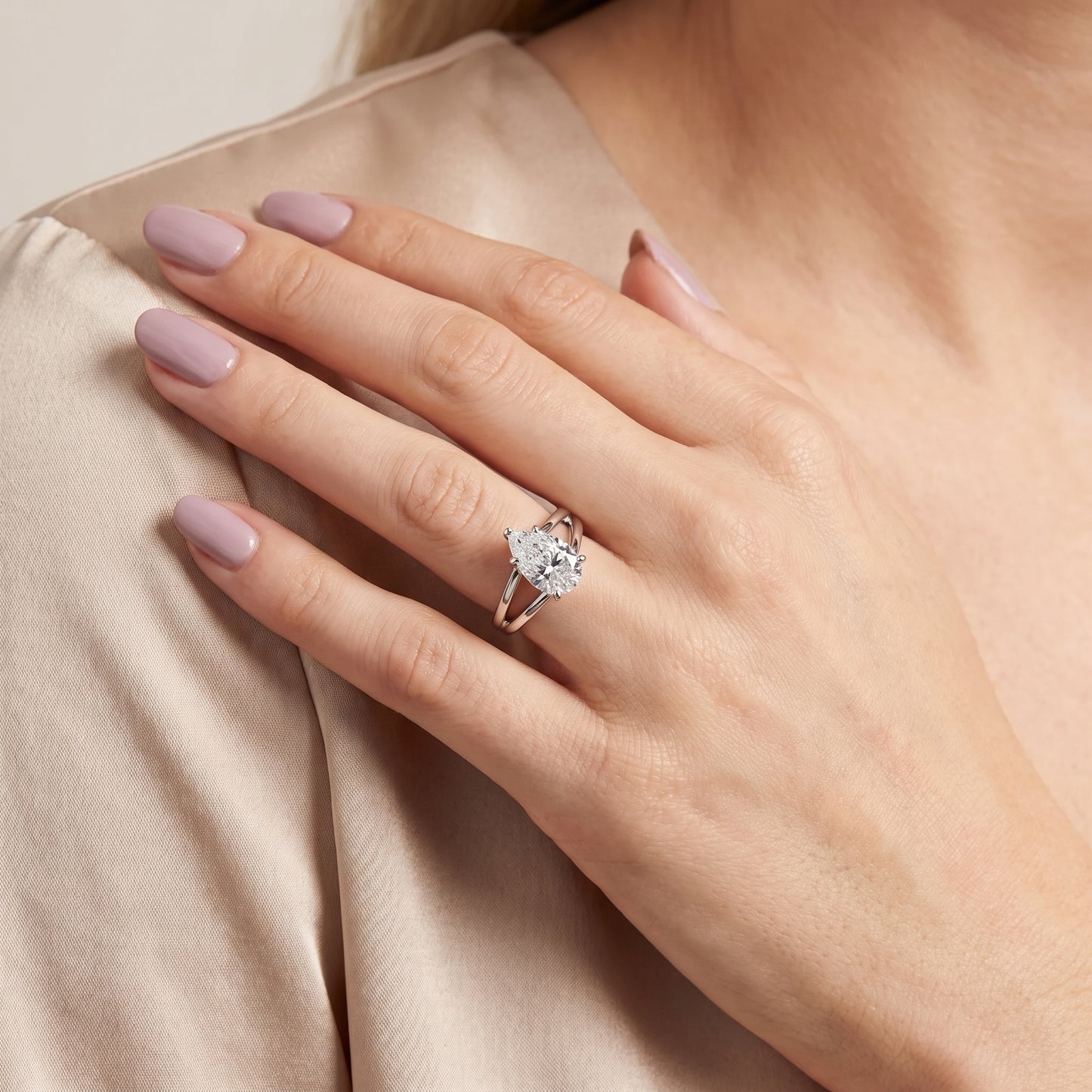 Giselle Solitaire Split Shank Pear Diamond Engagement Ring in Silver - model.jpg