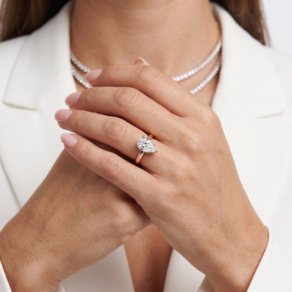 Delia Solitaire Pear Diamond Engagement Ring in Rose Gold - model.jpg