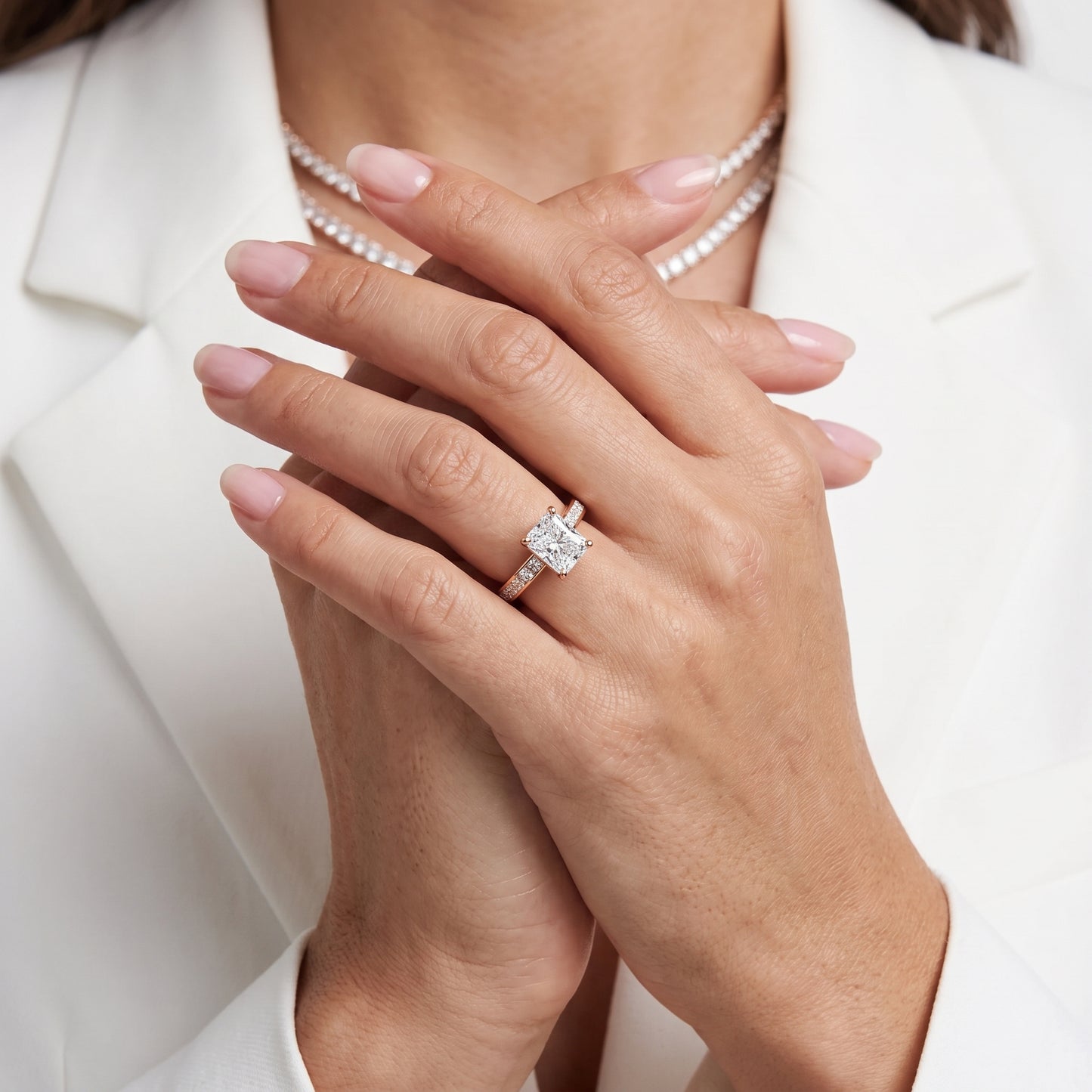 Brielle Channel Set Solitaire Radiant Diamond Ring in Rose Gold - model.jpg