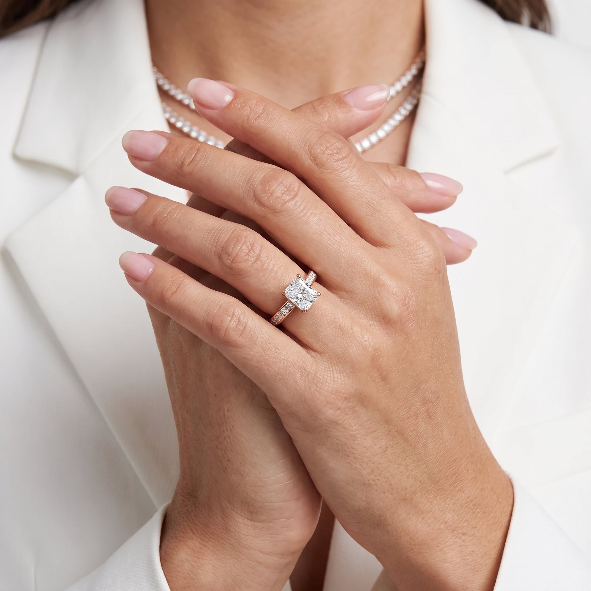 Brielle Channel Set Solitaire Radiant Diamond Ring in Rose Gold - model.jpg
