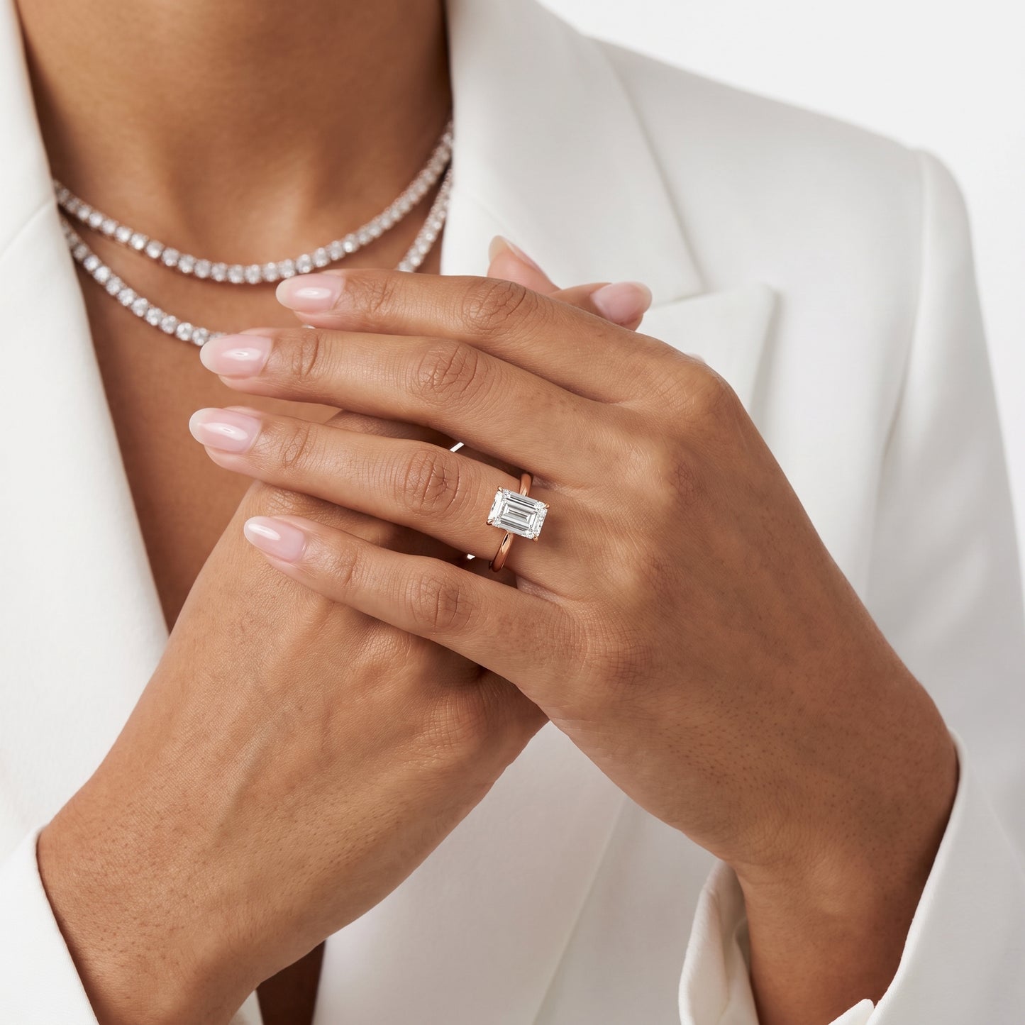 Evie Solitaire Six-Prong Emerald Diamond Engagement Ring in Rose Gold - model.jpg