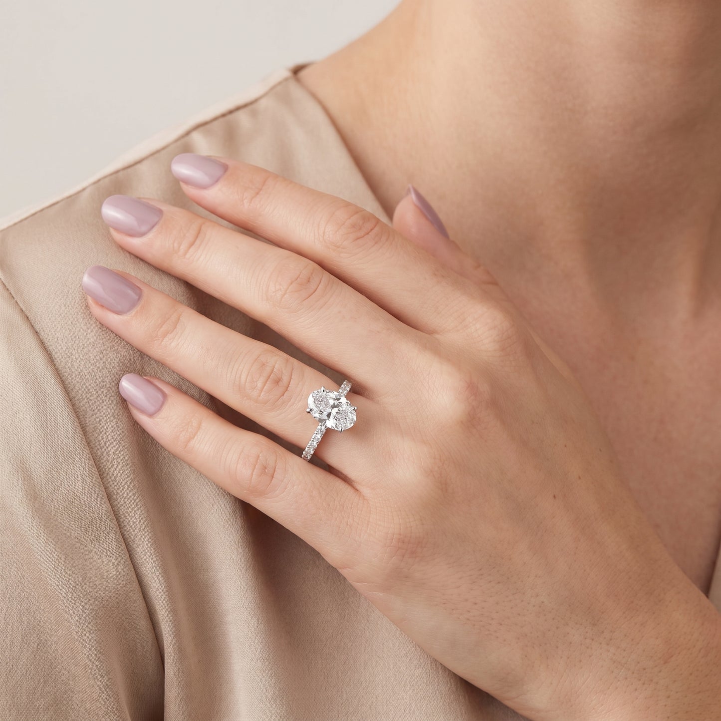 Aisha Pavé Solitaire Oval Diamond Engagement Ring in White Gold - model.jpg