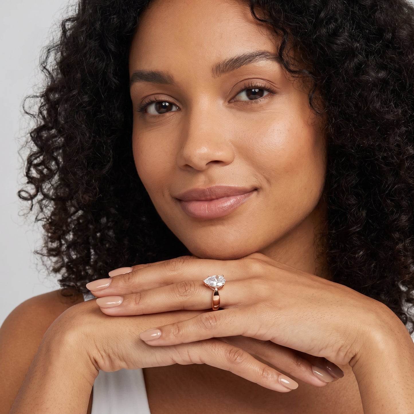 Talia Solitaire Twist Pear Diamond Engagement Ring in Rose Gold - model.jpg
