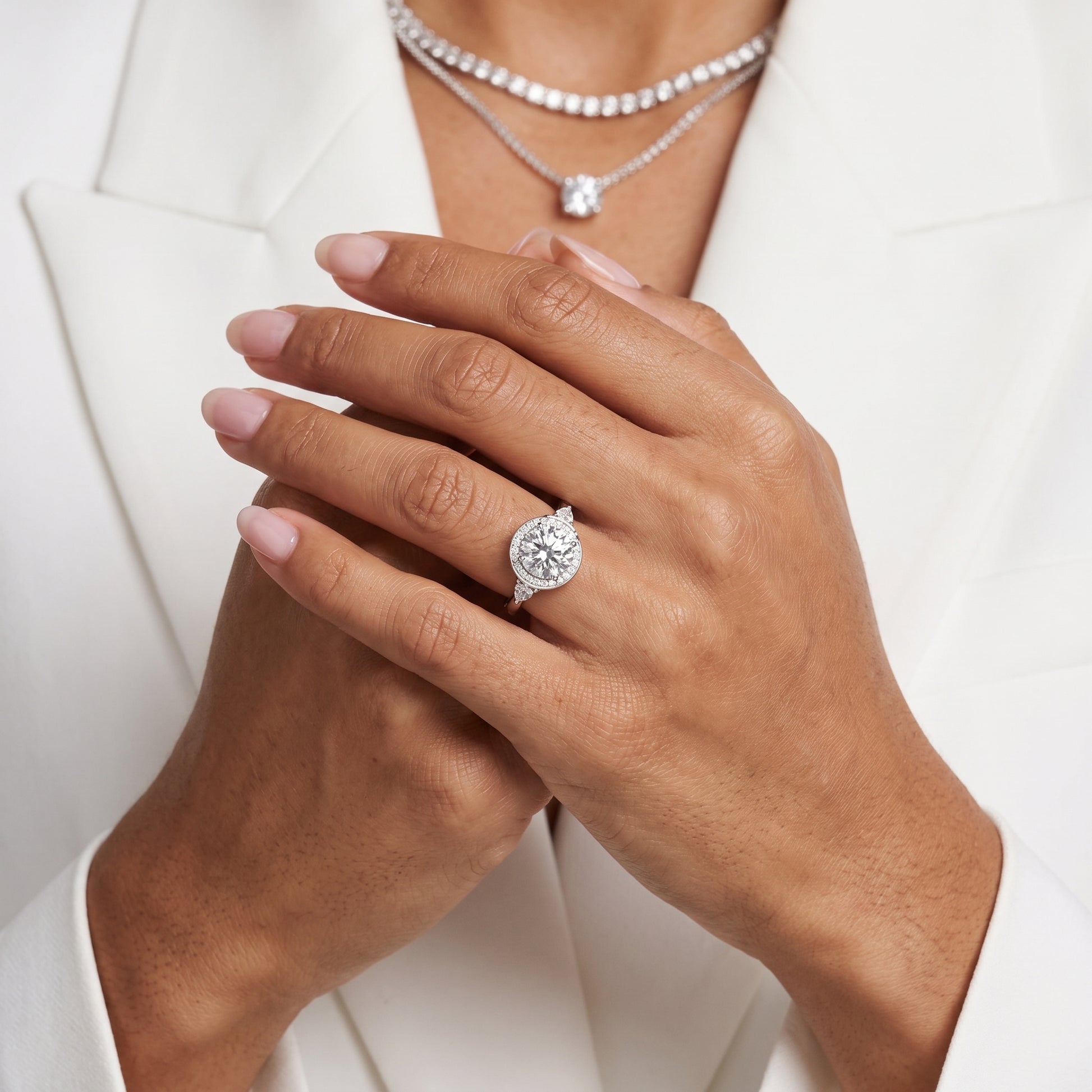 Eliza Halo Sidestone Round Diamond Engagement Ring in Silver - model.jpg