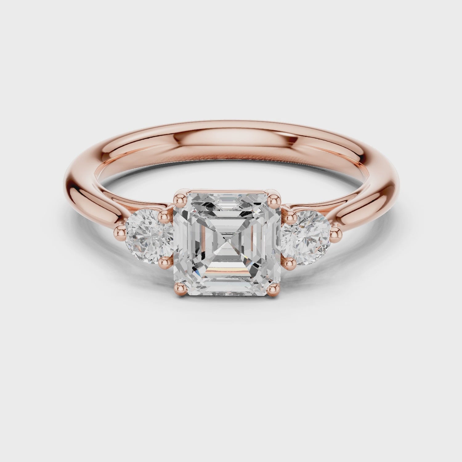 Essential Three-Stone Asscher & Round Diamond Engagement Ring in Rose Gold