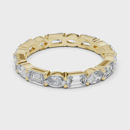 Wave Alternating Emerald & Oval Diamond Eternity Band in Yellow Gold