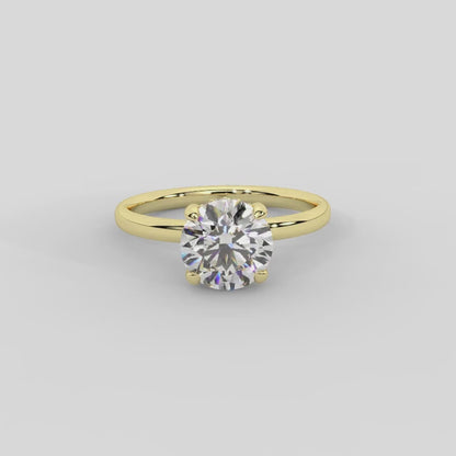 Charlotte Charm Solitaire Emerald Diamond Engagement Ring in Yellow Gold