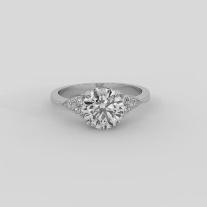 Amelia Three Stone Emerald Diamond Engagement Ring in Platinum