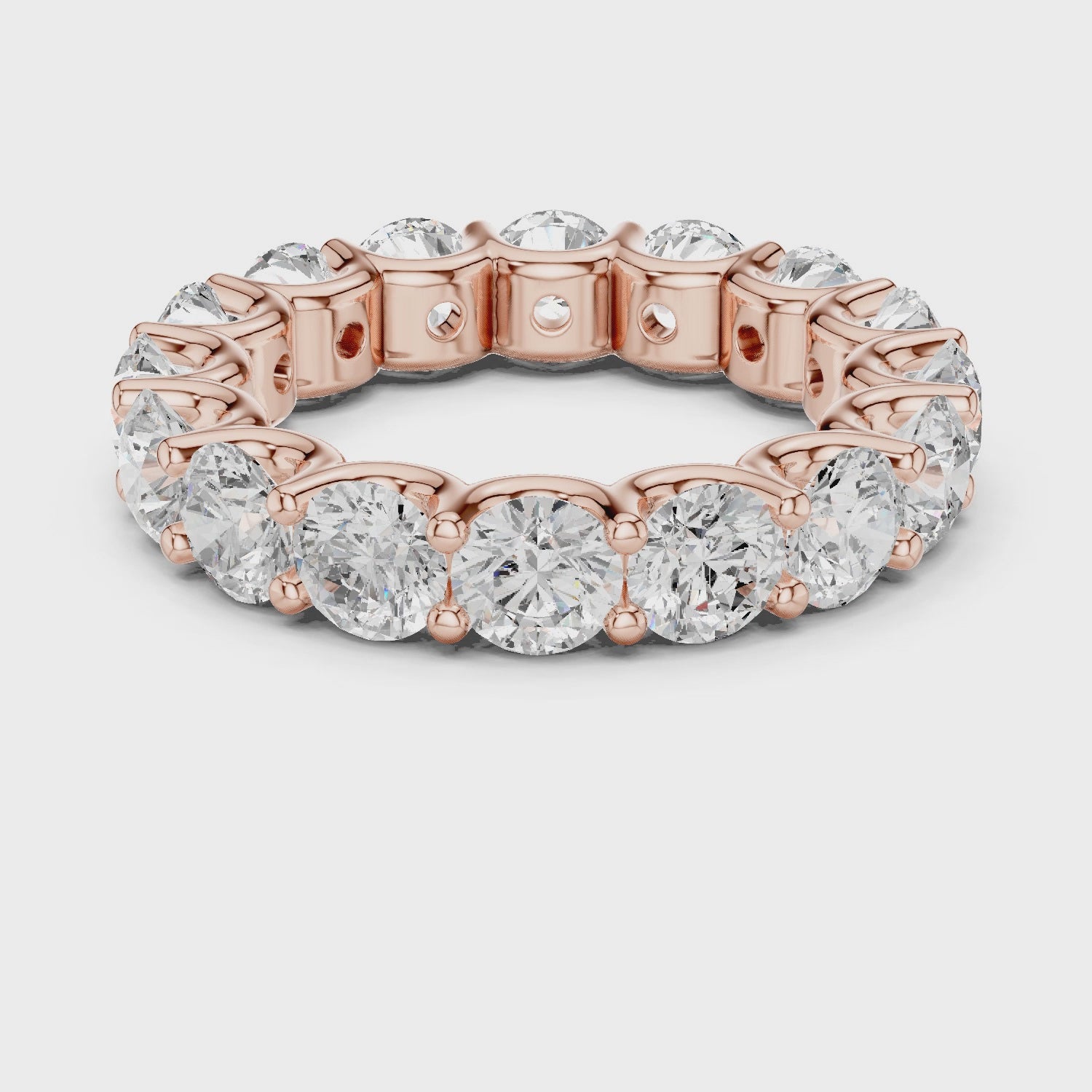 Warm Brilliance Round Diamond Eternity Band in Rose Gold