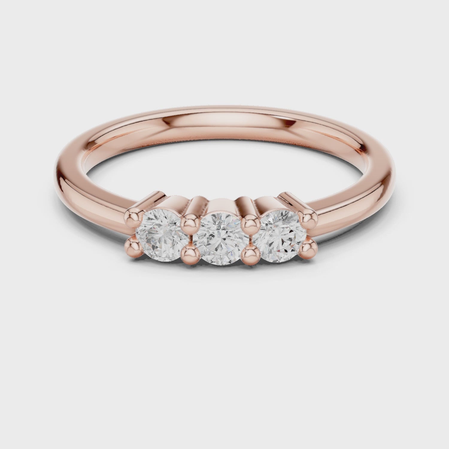 Celeste Three-Stone Round Diamond Ring in Rose Gold