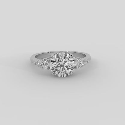 Grace Three Stone Emerald Diamond Engagement Ring in Platinum