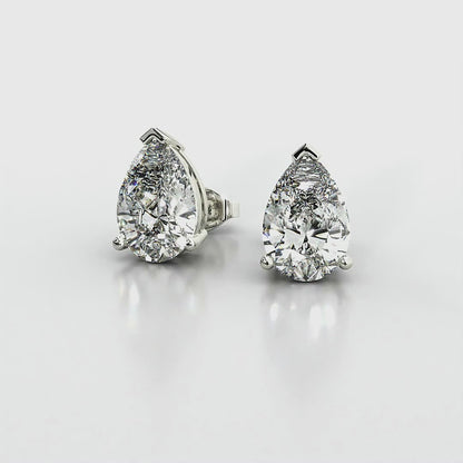 Three Prong Pear Diamond Stud Earrings in Platinum