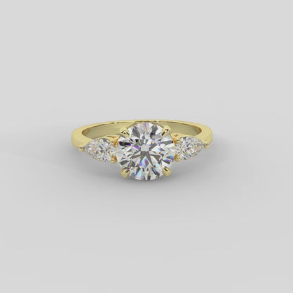 Grace Three Stone Princess Diamond Engagement Ring in Yellow Gold
