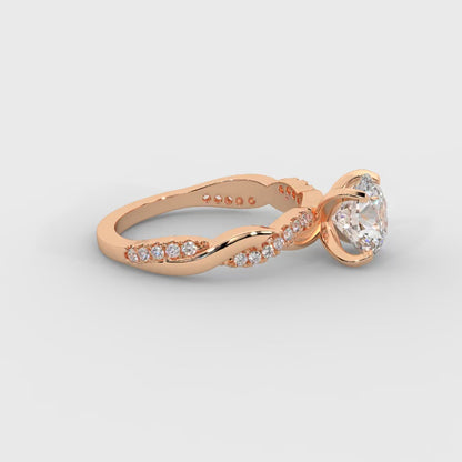 Twisted Side Stone Emerald Diamond Engagement Ring in Rose Gold