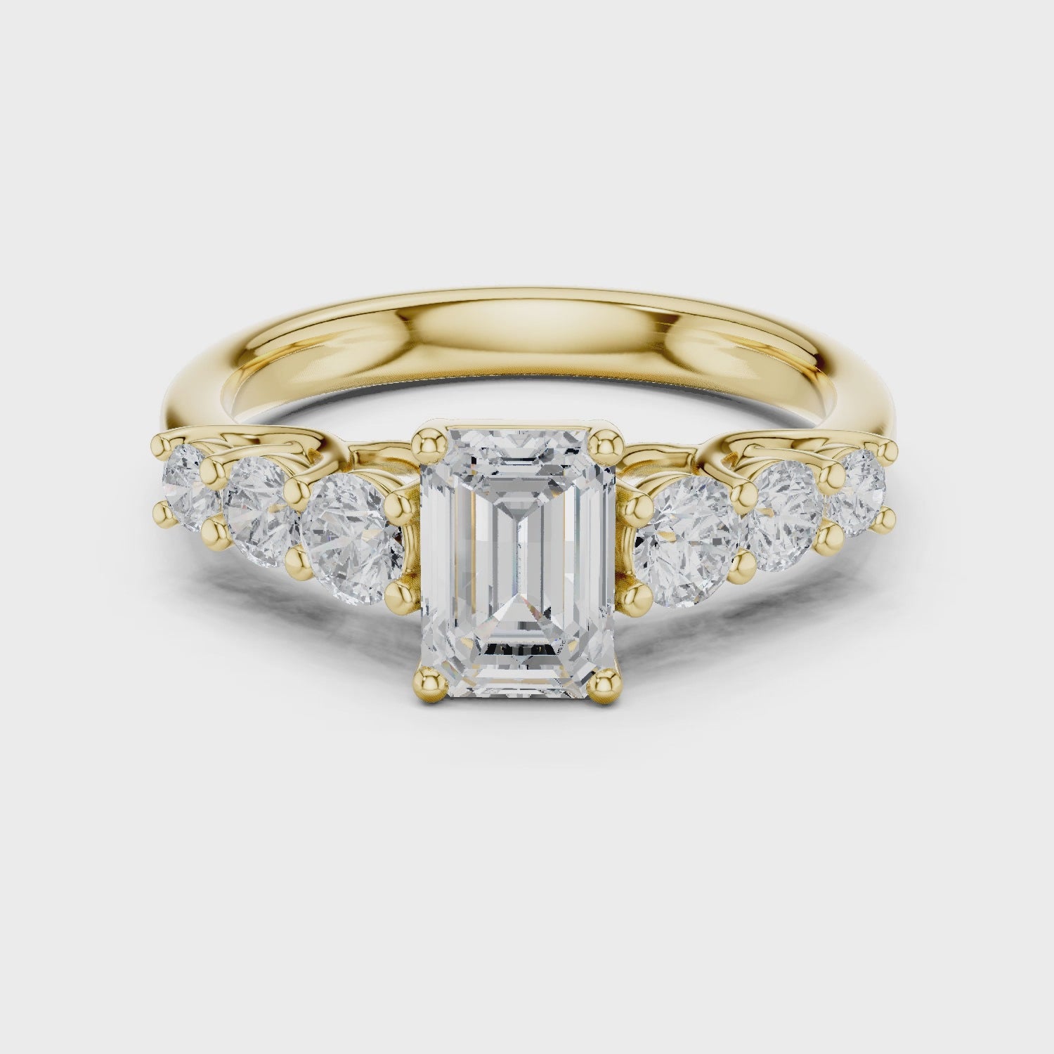 Celeste Seven-Stone Emerald & Round Diamond Engagement Ring in Yellow Gold