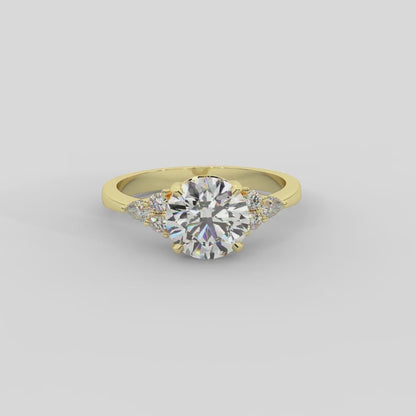 Amelia Three Stone Round Diamond Engagement Ring in Yellow Gold