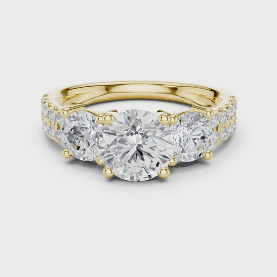 Celeste Three-Stone Round Diamond Engagement Ring in Yellow Gold