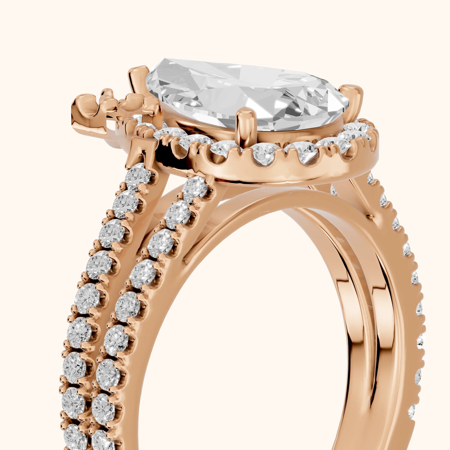 Kira Halo Split Shank Pear Diamond Engagement Ring in Rose Gold - slant-view.webp