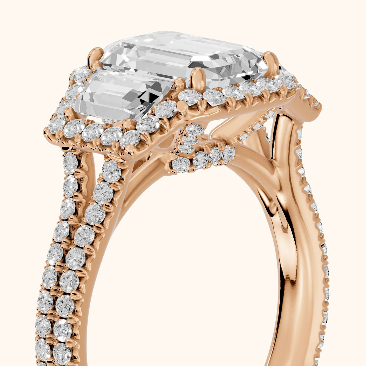 Oakley Three-Stone Split Shank Emerald Diamond Engagement Ring in Rose Gold - slant-view.webp