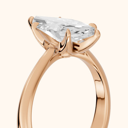 Evie Solitaire Six-Prong Marquise Diamond Engagement Ring in Rose Gold - slant-view.webp