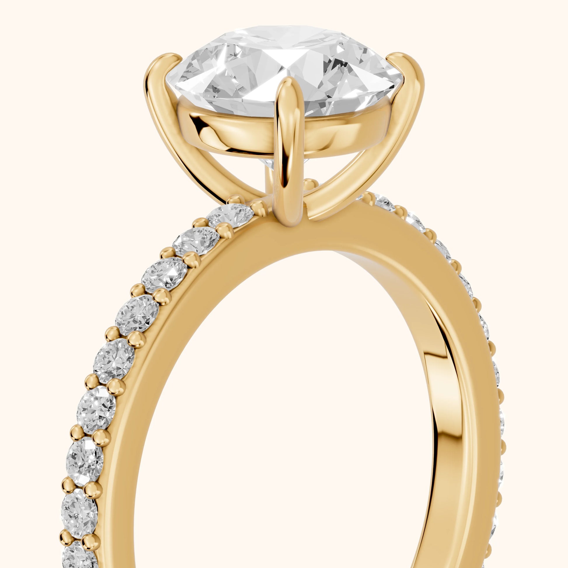 Aisha Pavé Solitaire Round Diamond Engagement Ring in Yellow Gold - slant-view.webp
