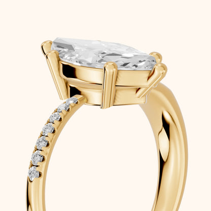 Rosie Solitaire Basket Marquise Diamond Engagement Ring in Yellow Gold - slant-view.webp