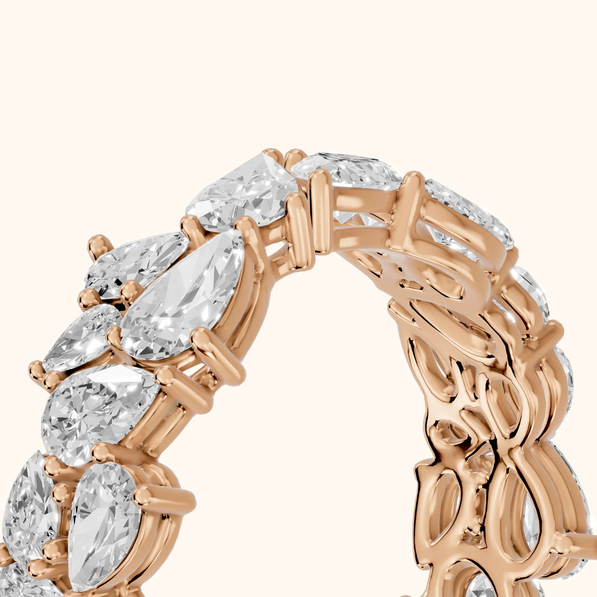 Fleur Shared Prong Pear Diamond Eternity Band in Rose Gold - slant-view