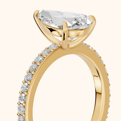 Aisha Pavé Solitaire Pear Diamond Engagement Ring in Yellow Gold - slant-view.webp