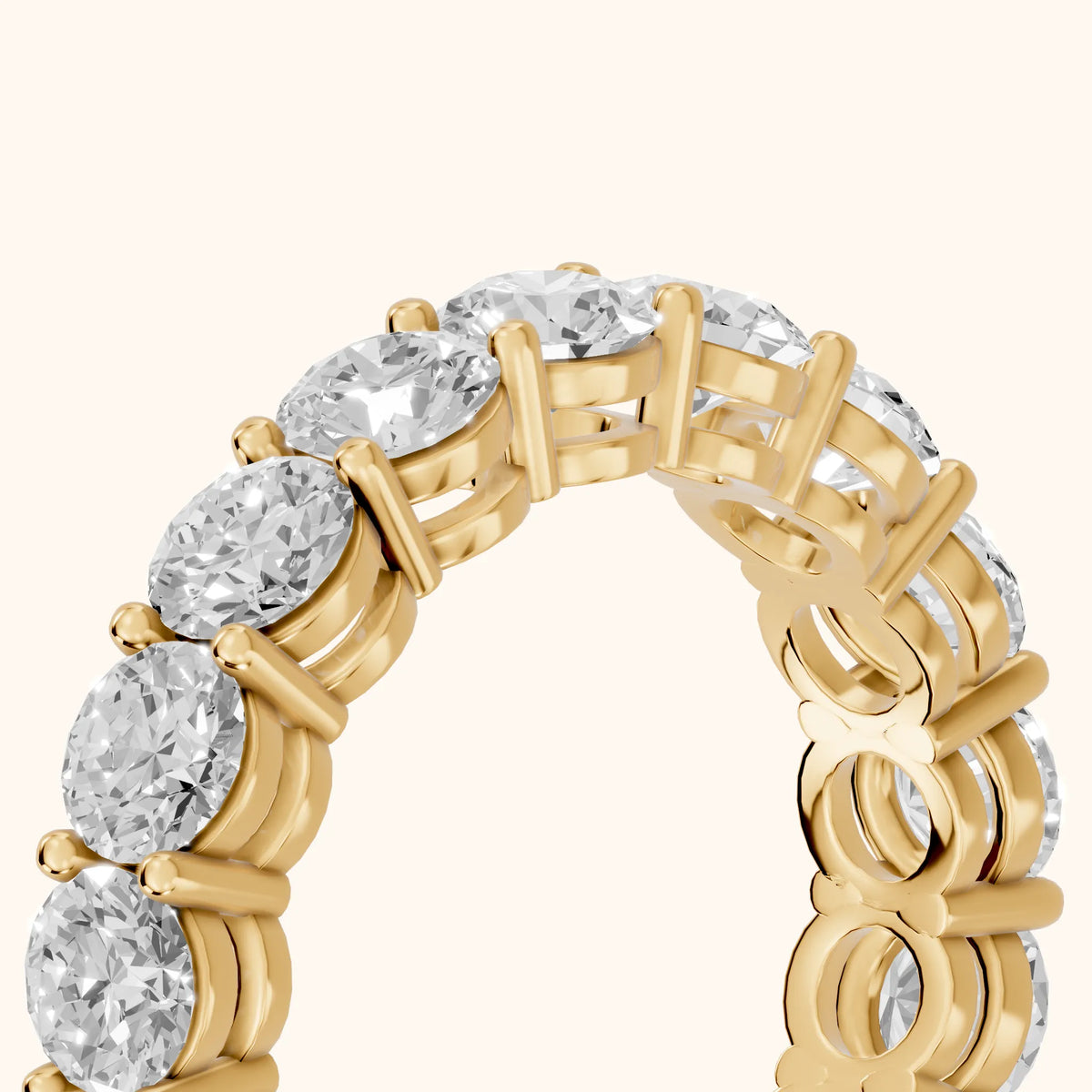 Camille Shared Prong Round Diamond Eternity Band in Yellow Gold - slant-view