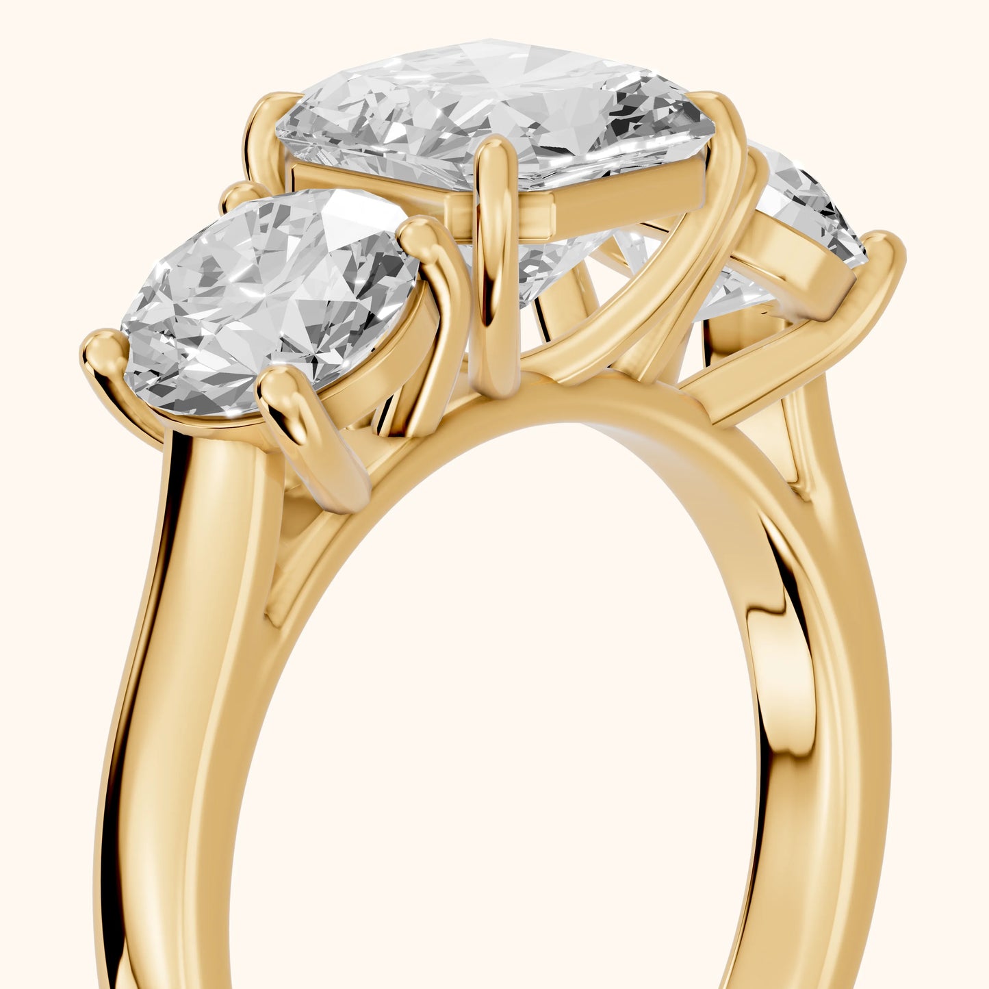 Esme Three-Stone Tapered Radiant Diamond Ring in Yellow Gold - slant-view.webp