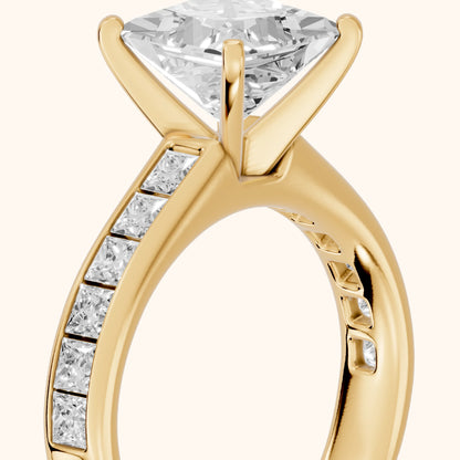 Frisco Channel Set Princess Diamond Engagement Ring in Yellow Gold - slant-view.webp