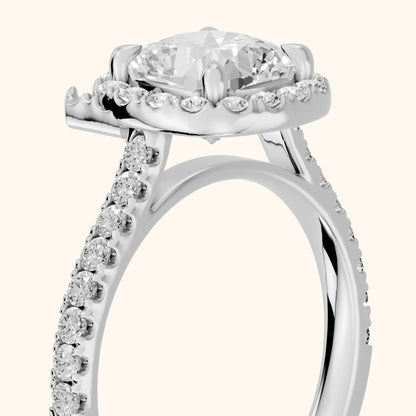 Amara Halo Claw Prong Cushion Diamond Ring in Platinum - slant-view.webp