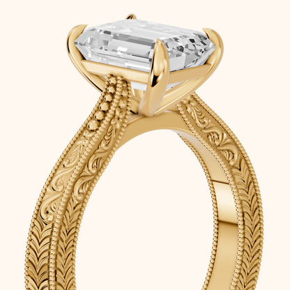 Kailua Vintage Engraved Emerald Diamond Engagement Ring in Yellow Gold - slant-view.webp