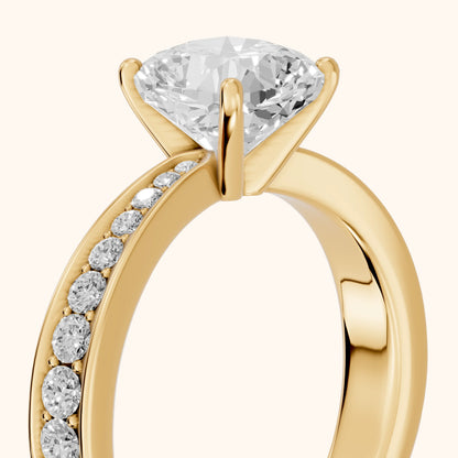 Rhea Sidestone Pavé Cushion Diamond Engagement Ring in Yellow Gold - slant-view.webp