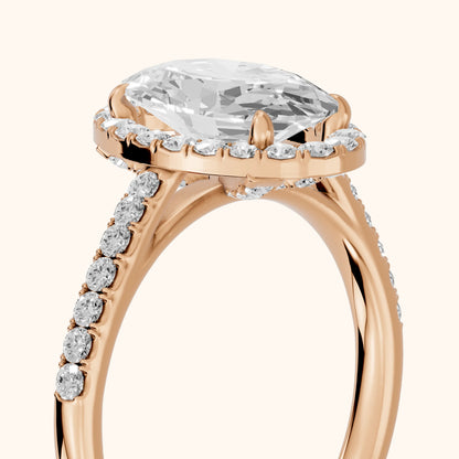 Alma Halo Pavé Oval Diamond Ring in Rose Gold - slant-view.webp
