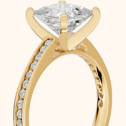 Tessa Solitaire Channel Set Princess Diamond Engagement Ring in Yellow Gold - slant-view.webp
