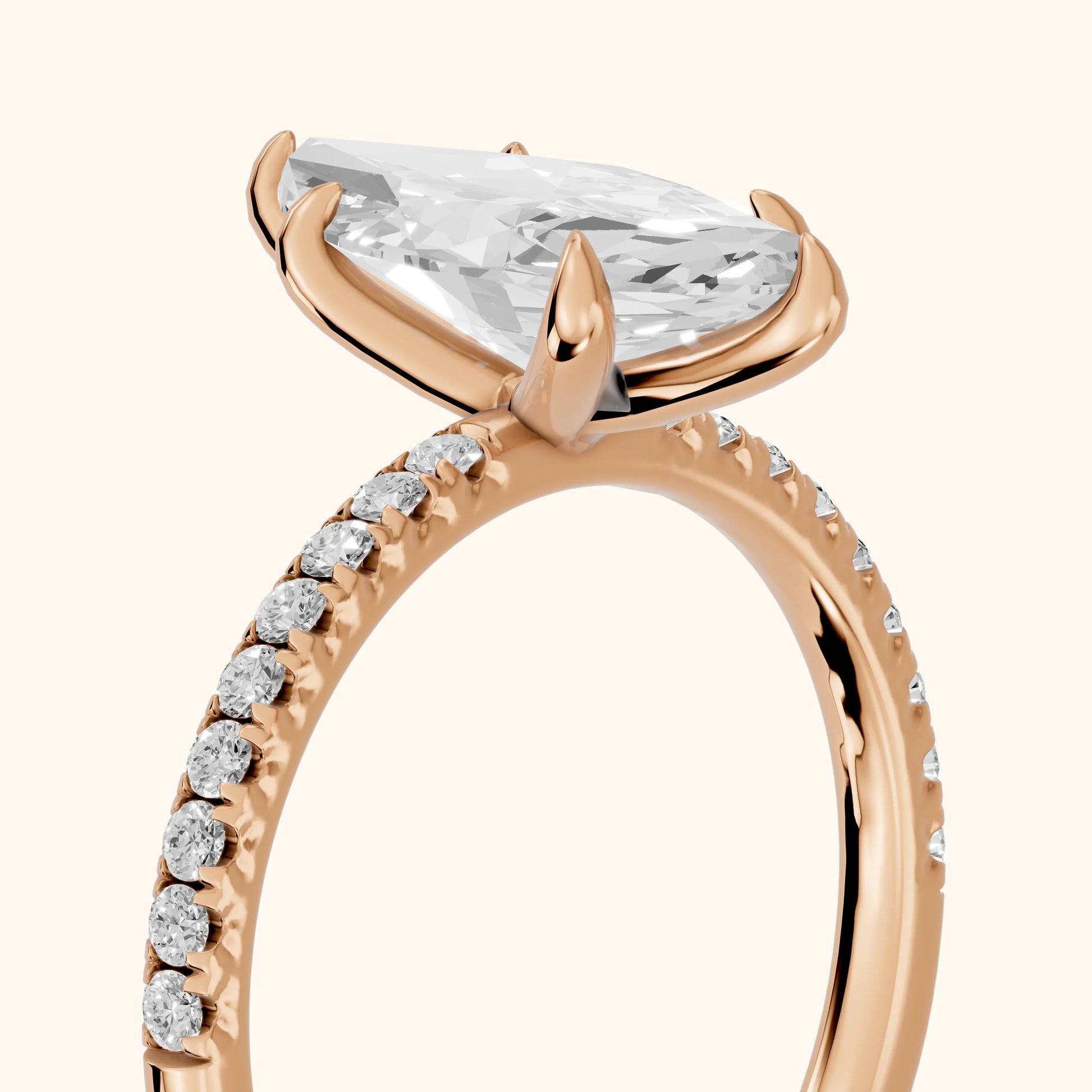 Ione Solitaire Pavé Marquise Diamond Engagement Ring in Rose Gold - slant-view.webp