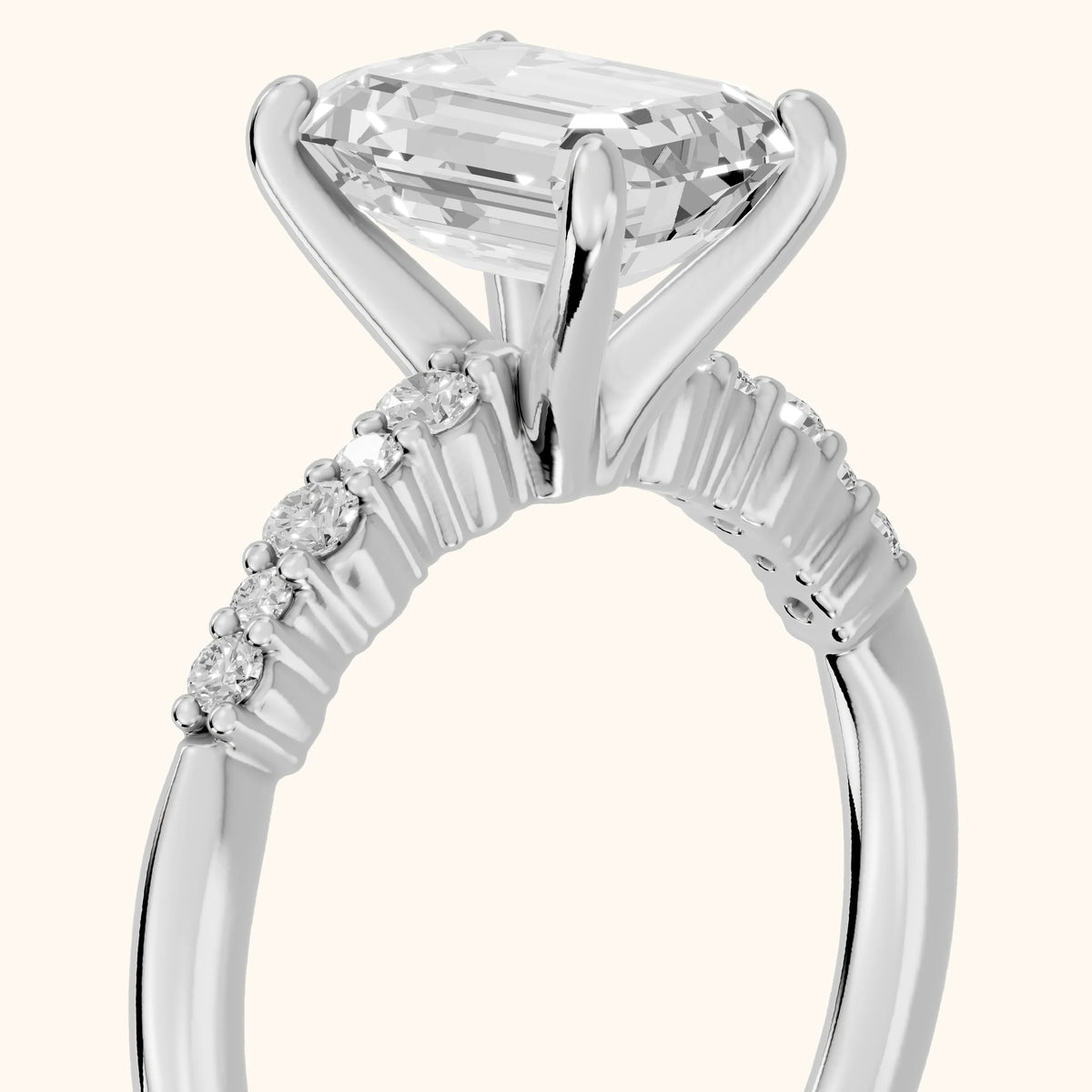 Deirdre Graduated Pavé Emerald Diamond Engagement Ring in White Gold - slant-view.webp