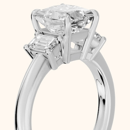 Babette Deco Three-Stone Princess Diamond Engagement Ring in Platinum - slant-view.webp