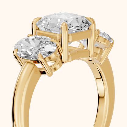 Lila Three-Stone Radiant Diamond Ring in Yellow Gold - slant-view.webp