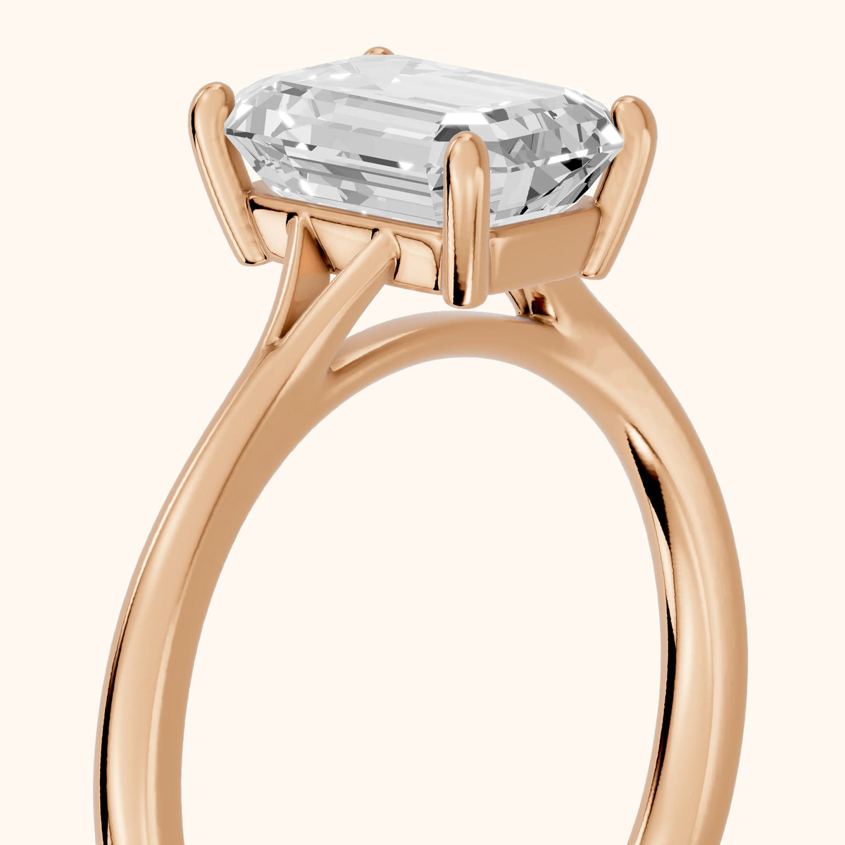 Blanche Solitaire Split Shank Emerald Diamond Engagement Ring in Rose Gold - slant-view.webp