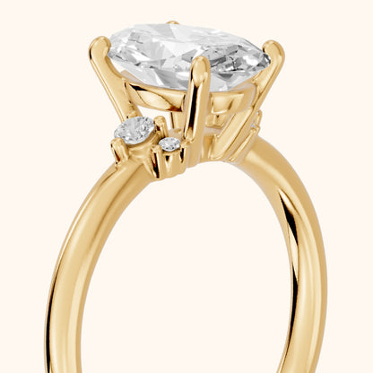Wynne Cluster Oval Diamond Engagement Ring in Yellow Gold - slant-view.webp