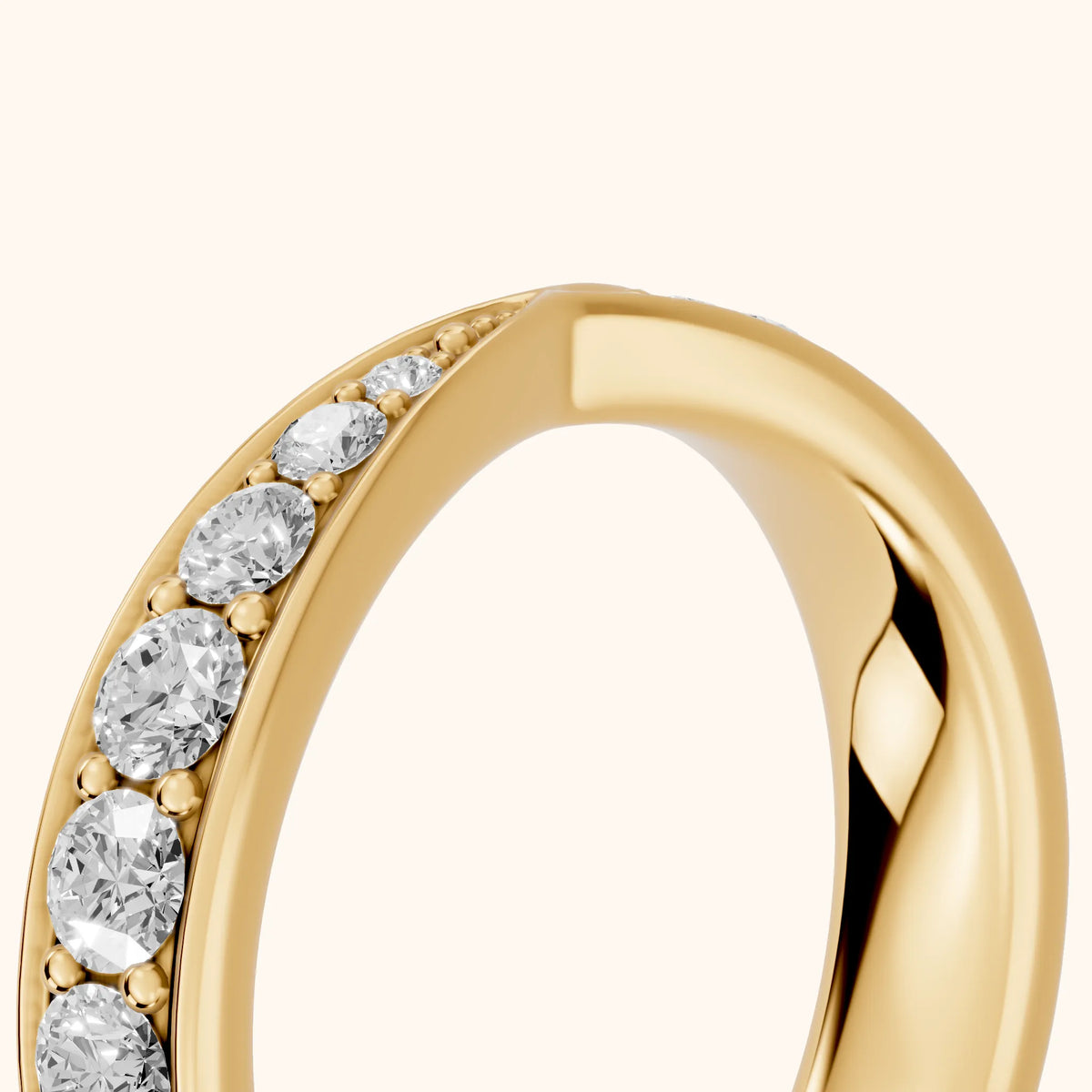 Julia Tapered Riviera Round Diamond Eternity Band in Yellow Gold - slant-view