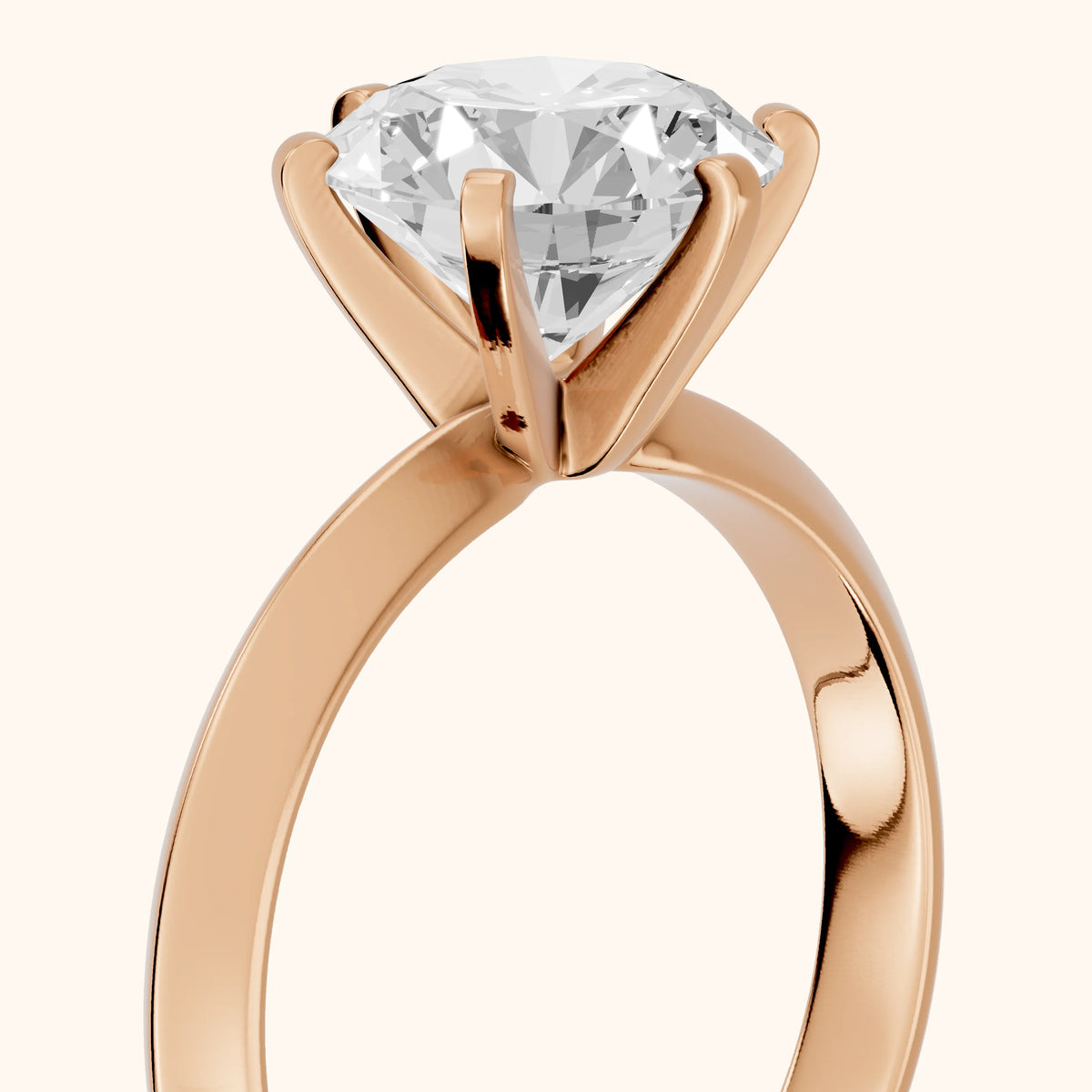 Hailey Solitaire Knife Edge Round Diamond Engagement Ring in Rose Gold - slant-view.webp
