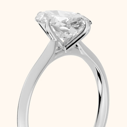 Ginette Solitaire Knife Edge Oval Diamond Engagement Ring in Silver - slant-view.webp